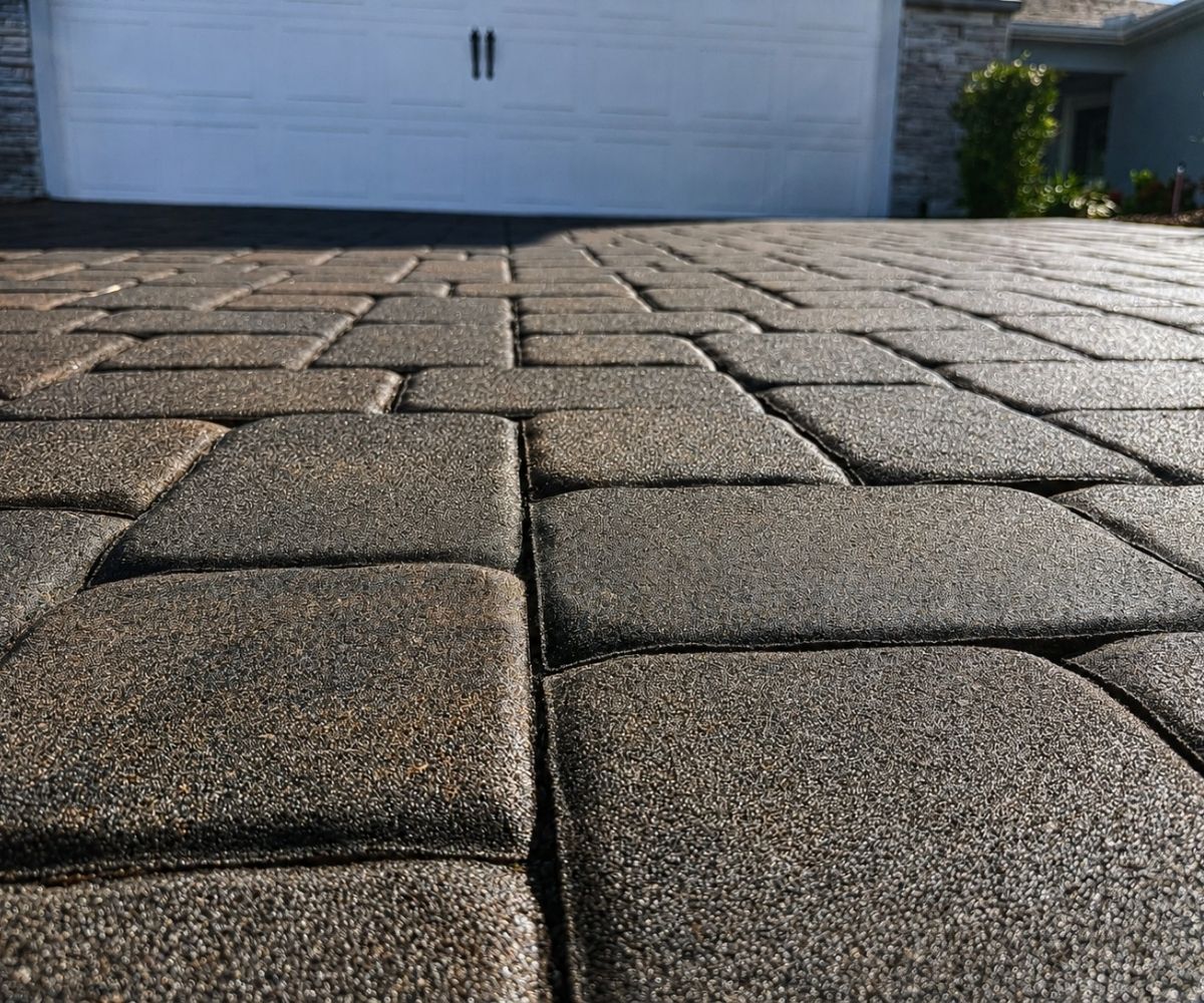 Close-up of a sealed paver driveway surface after repair in Saint Augustine, Florida