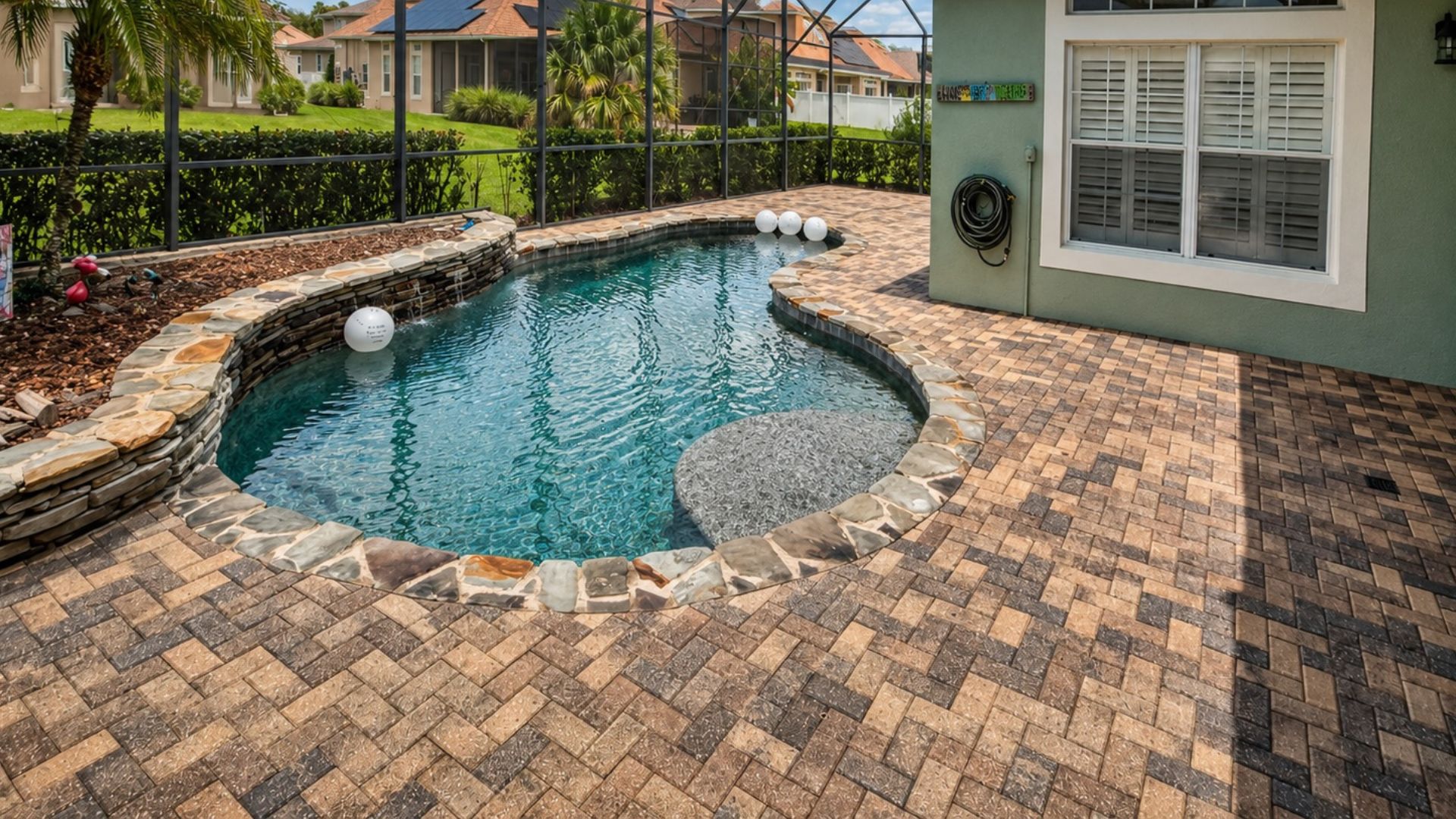 Curved pool deck with stone coping, cleaned and sealed in Saint Augustine, Florida